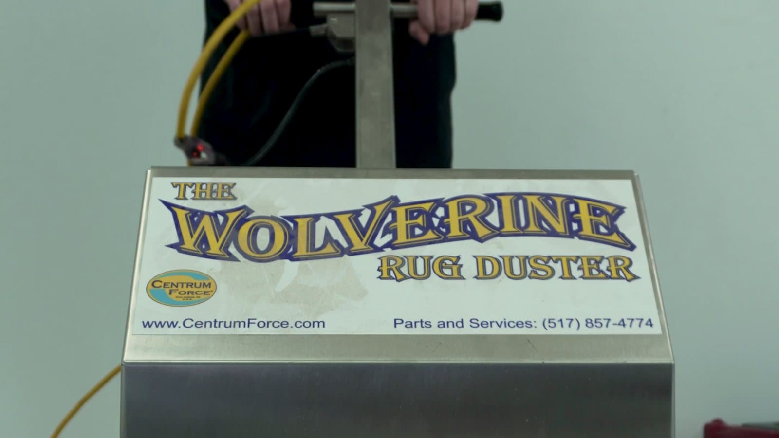 PuroClean technician operating a professional rug duster at the Kingston facility